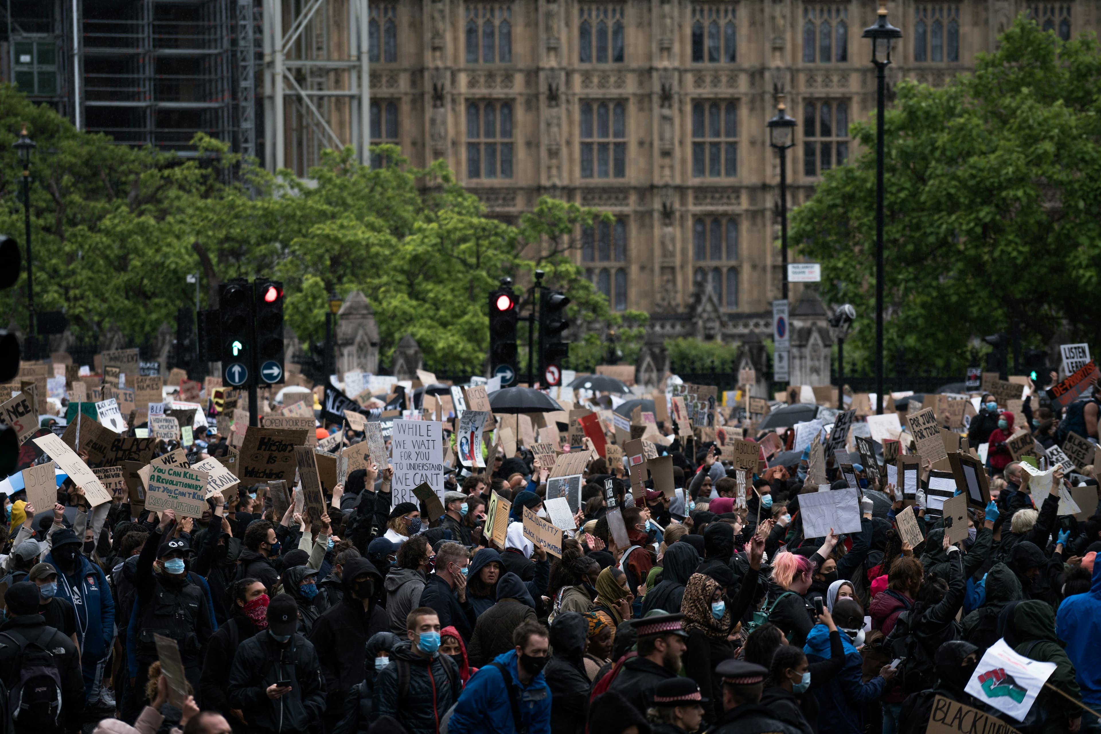 Street scene showing civil unrest and emergency response activity